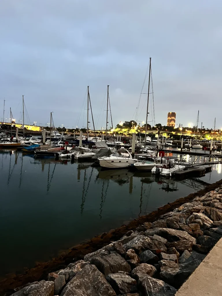 Bouregreg Marina in Rabat with boats and Hassan Tower in the background