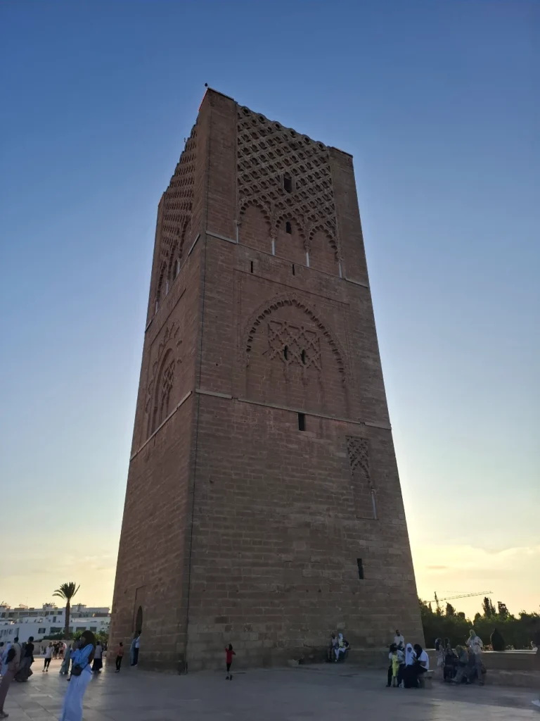 Hassan Tower in Rabat at sunset, showing its carved Almohad sandstone facade