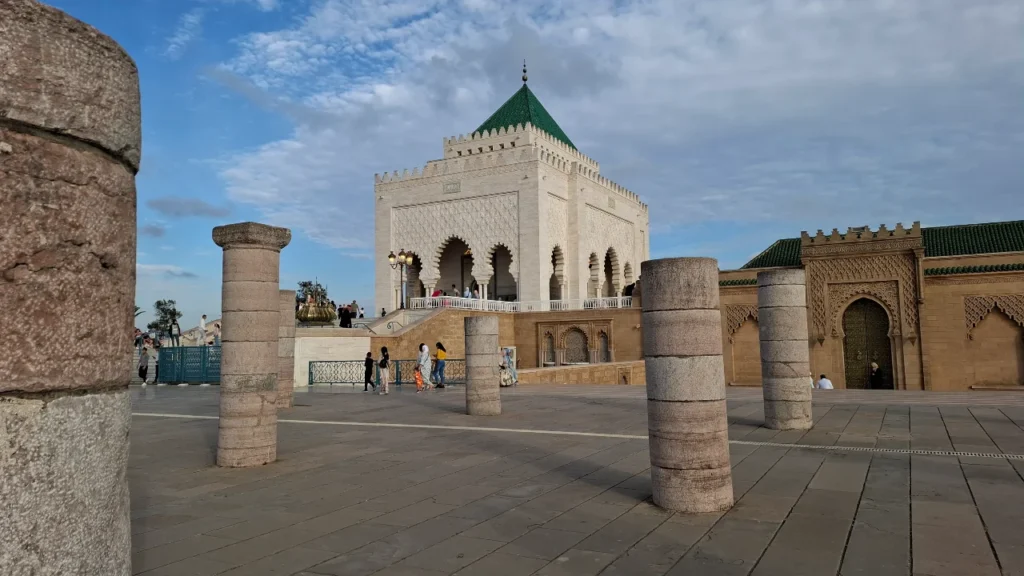Mausoleum of Mohammed V seen through the unfinished columns of Hassan Tower esplanade — Rabat, Morocco